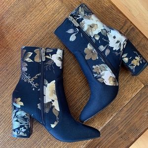 Black floral heeled boots